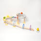 Circuit Musical à Billes Montessori – L’éveil sensoriel qui fait mouche