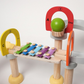 Circuit Musical à Billes Montessori – L’éveil sensoriel qui fait mouche